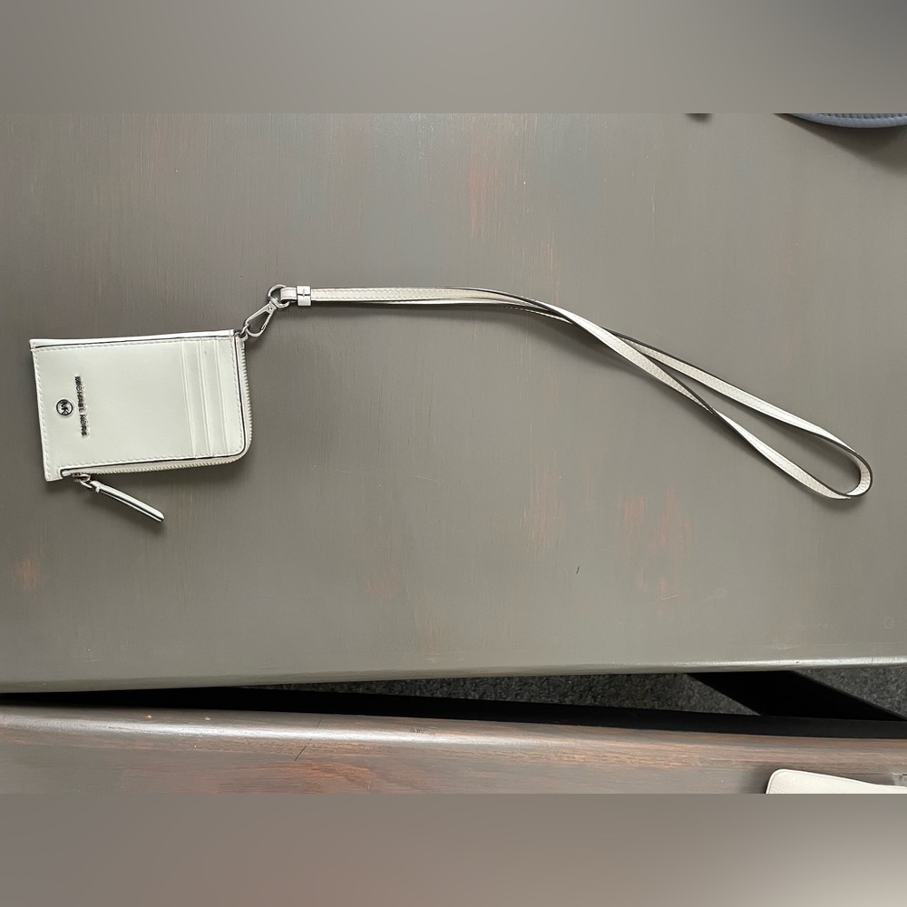 Michael Kors card holder with lanyard.